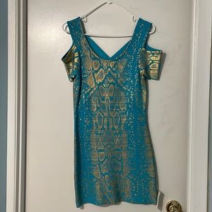 Venus body on Blue and gold cold shoulder mini dress